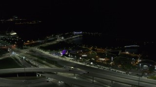 5.7K aerial stock footage of a festival park near the waterfront museum at night, Downtown Milwaukee, Wisconsin Aerial Stock Footage | DX0002_151_028