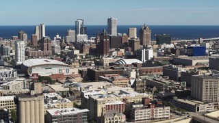 5.7K aerial stock footage a view of the city's skyline and arena in Downtown Milwaukee, Wisconsin, seen from I-43 freeway Aerial Stock Footage | DX0002_152_023