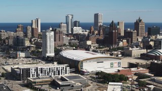 5.7K aerial stock footage stationary view of the city's skyline and arena in Downtown Milwaukee, Wisconsin Aerial Stock Footage | DX0002_152_032