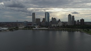 DX0002_154_012 - 5.7K aerial stock footage of the city's waterfront skyline seen from Lake Michigan in Downtown Milwaukee, Wisconsin