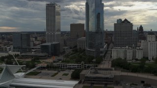 DX0002_154_019 - 5.7K aerial stock footage of flying by tall skyscrapers in Downtown Milwaukee, Wisconsin