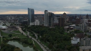 5.7K aerial stock footage stationary view of the city's skyline from pond at Veterans Park, Downtown Milwaukee, Wisconsin Aerial Stock Footage | DX0002_154_038