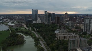 5.7K aerial stock footage reverse view of the city's skyline from Veterans Park, Downtown Milwaukee, Wisconsin Aerial Stock Footage | DX0002_154_039