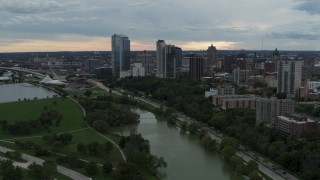 DX0002_154_040 - 5.7K aerial stock footage of the city's skyline, seen seen while passing Veterans Park, Downtown Milwaukee, Wisconsin