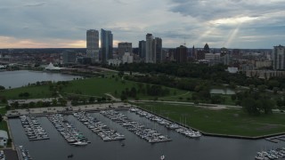 5.7K aerial stock footage descend and flyby Veterans Park and skyline of Downtown Milwaukee, Wisconsin Aerial Stock Footage | DX0002_154_042