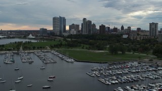 5.7K aerial stock footage fly over marina toward Veterans Park and skyline of Downtown Milwaukee, Wisconsin Aerial Stock Footage | DX0002_154_044