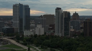 5.7K aerial stock footage slowly passing the city's skyline at sunset, Downtown Milwaukee, Wisconsin Aerial Stock Footage | DX0002_155_005