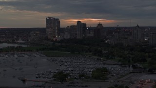 5.7K aerial stock footage flyby marina and the city's skyline at twilight, Downtown Milwaukee, Wisconsin Aerial Stock Footage | DX0002_155_035