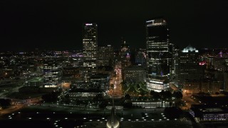 DX0002_157_001 - 5.7K aerial stock footage of tall skyscrapers at night, Downtown Milwaukee, Wisconsin