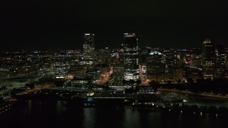 5.7K aerial stock footage of towering skyscrapers near the shoreline at night, Downtown Milwaukee, Wisconsin Aerial Stock Footage | DX0002_157_007