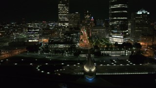 5.7K aerial stock footage ascend over museum for view of Wisconsin Ave at night, Downtown Milwaukee, Wisconsin Aerial Stock Footage | DX0002_157_022