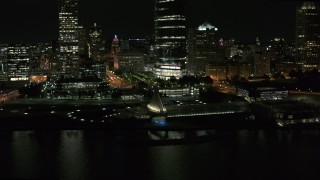 5.7K aerial stock footage a stationary view of the lakefront museum at night, Downtown Milwaukee, Wisconsin Aerial Stock Footage | DX0002_157_023