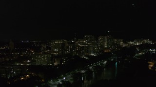 5.7K aerial stock footage of flying by a row of apartment buildings at night, Milwaukee, Wisconsin Aerial Stock Footage | DX0002_157_029