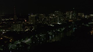 5.7K aerial stock footage fly past a row of apartment buildings at night, Milwaukee, Wisconsin Aerial Stock Footage | DX0002_157_031