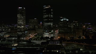 5.7K aerial stock footage of a wide orbit of a tall skyscraper at night, Downtown Milwaukee, Wisconsin Aerial Stock Footage | DX0002_157_033