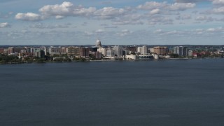 5.7K aerial stock footage a wide view of lakefront city buildings in Madison, Wisconsin Aerial Stock Footage | DX0002_158_002