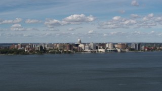 5.7K aerial stock footage slowly passing lakefront city buildings in Madison, Wisconsin Aerial Stock Footage | DX0002_158_008