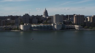 5.7K aerial stock footage flyby convention center with capitol and office buildings in background, Madison, Wisconsin Aerial Stock Footage | DX0002_160_007