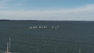 5.7K aerial stock footage of orbiting a group of sailboats on Lake Mendota, Madison, Wisconsin Aerial Stock Footage | DX0002_160_036