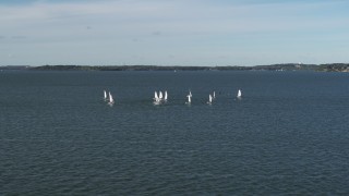 5.7K aerial stock footage of circling a group of sailboats on Lake Mendota, Madison, Wisconsin Aerial Stock Footage | DX0002_160_037