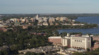 DX0002_161_007 - 5.7K aerial stock footage of the capitol dome and downtown seen from hospital, Madison, Wisconsin