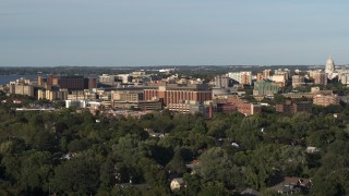 DX0002_161_012 - 5.7K aerial stock footage of orbiting a hospital near downtown during descent, Madison, Wisconsin