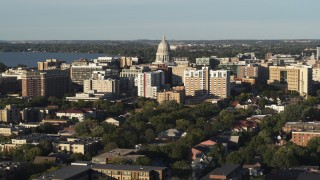 5.7K aerial stock footage ascend and flyby the capitol dome and downtown buildings, Madison, Wisconsin Aerial Stock Footage | DX0002_161_019