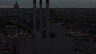 5.7K aerial stock footage orbit power plant smoke stacks at twilight, Madison, Wisconsin Aerial Stock Footage | DX0002_162_011