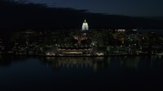 5.7K aerial stock footage a stationary view and approach to the capitol dome and convention center at night, Madison, Wisconsin Aerial Stock Footage | DX0002_162_032