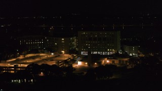 5.7K aerial stock footage of an orbit of a hospital at night, Madison, Wisconsin Aerial Stock Footage | DX0002_163_017