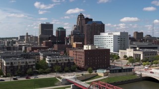 5.7K aerial stock footage the city's skyline seen while passing apartment buildings in Downtown Des Moines, Iowa Aerial Stock Footage | DX0002_165_003