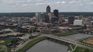 DX0002_165_019 - 5.7K aerial stock footage a reverse view of skyline across the river, Downtown Des Moines, Iowa