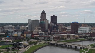 5.7K aerial stock footage of the city's skyline and Cedar River during ascent, Downtown Des Moines, Iowa Aerial Stock Footage | DX0002_165_029