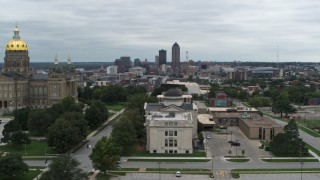 DX0002_166_033 - 5.7K aerial stock footage the distant skyline seen from the state library building and Iowa State Capitol, Downtown Des Moines, Iowa