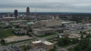 5.7K aerial stock footage orbit and fly away from a hospital in Des Moines, Iowa Aerial Stock Footage | DX0002_166_045