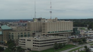 5.7K aerial stock footage fly away from a hospital in Des Moines, Iowa Aerial Stock Footage | DX0002_167_006