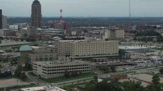 5.7K aerial stock footage reverse view of a hospital in Des Moines, Iowa Aerial Stock Footage | DX0002_167_007