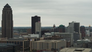 DX0002_167_014 - 5.7K aerial stock footage flyby and away from skyscraper and office buildings in Downtown Des Moines, Iowa