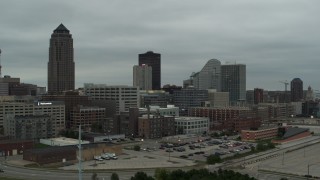 5.7K aerial stock footage of flying by office buildings around the skyscraper in Downtown Des Moines, Iowa Aerial Stock Footage | DX0002_167_024