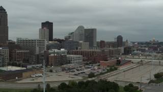 5.7K aerial stock footage approach and flyby office buildings near the skyscraper in Downtown Des Moines, Iowa, view of capitol Aerial Stock Footage | DX0002_167_029