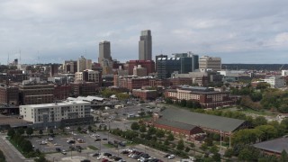 DX0002_168_005 - 5.7K aerial stock footage of passing by the city's skyline in Downtown Omaha, Nebraska