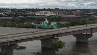 DX0002_169_010 - 5.7K aerial stock footage of light traffic crossing the I-480 bridge, Omaha, Nebraska