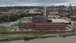 5.7K aerial stock footage of orbiting a riverfront apartment complex, Downtown Omaha, Nebraska Aerial Stock Footage | DX0002_169_032