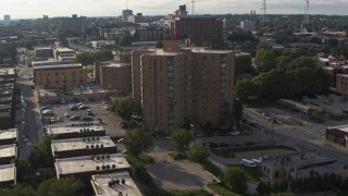 DX0002_170_031 - 5.7K aerial stock footage of orbiting an apartment building in Omaha, Nebraska