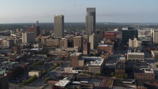 DX0002_170_042 - 5.7K aerial stock footage slowly orbiting the city's tall skyscrapers in Downtown Omaha, Nebraska