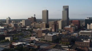 DX0002_170_044 - 5.7K aerial stock footage orbit office buildings and the city's tall skyscrapers in Downtown Omaha, Nebraska