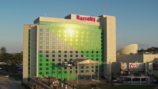 5.7K aerial stock footage of ascending over the hotel and casino at sunset in Council Bluffs, Iowa Aerial Stock Footage | DX0002_172_001