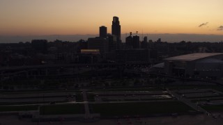 5.7K aerial stock footage of the skyline, reveal arena and convention center at twilight, Downtown Omaha, Nebraska Aerial Stock Footage | DX0002_172_038