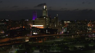 5.7K aerial stock footage approach the city's skyline at twilight, Downtown Omaha, Nebraska Aerial Stock Footage | DX0002_173_018