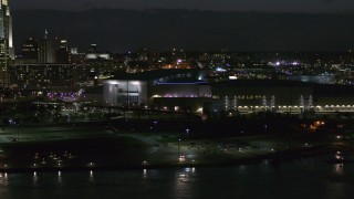 5.7K aerial stock footage orbiting arena and convention center complex at night, Downtown Omaha, Nebraska Aerial Stock Footage | DX0002_173_026